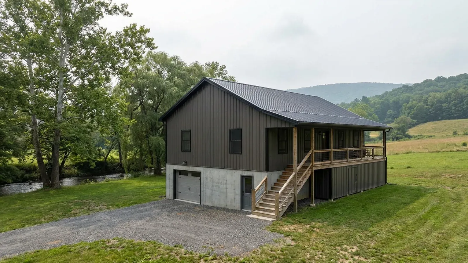 A barndominium raised on a stem-wall foundation with steps up to the entry and enclosed storage space beneath the elevated floor.